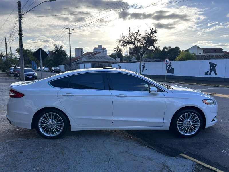 FORD FUSION TITANIUM 2.0 GTDI ECOBO.AWD AUT 2013/2013 LS MULTIMARCAS VENÂNCIO AIRES / Carros no Vale