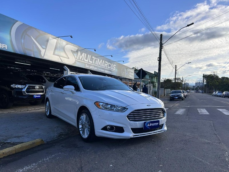 FORD FUSION TITANIUM 2.0 GTDI ECOBO.AWD AUT 2013/2013 LS MULTIMARCAS VENÂNCIO AIRES / Carros no Vale
