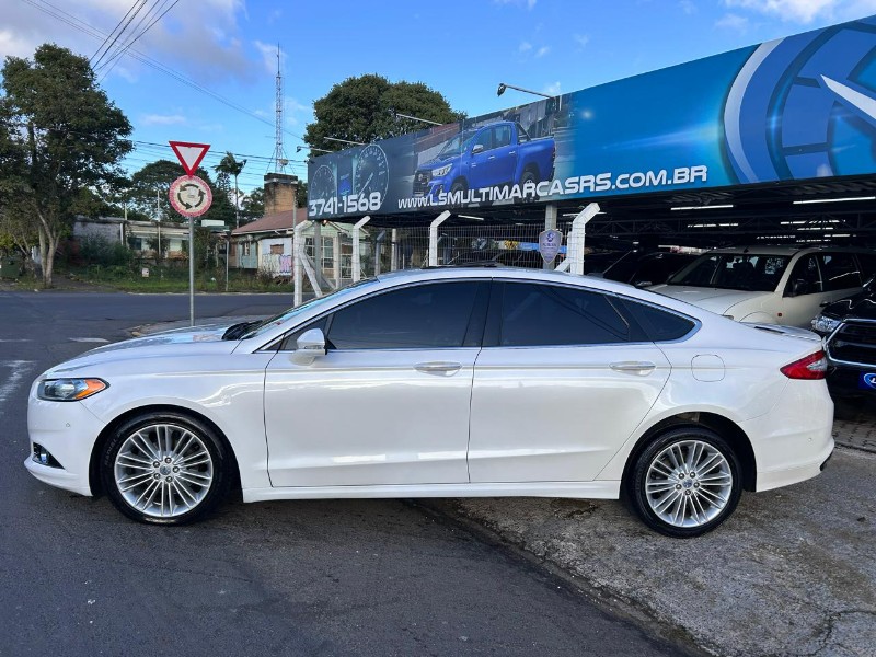FORD FUSION TITANIUM 2.0 GTDI ECOBO.AWD AUT 2013/2013 LS MULTIMARCAS VENÂNCIO AIRES / Carros no Vale