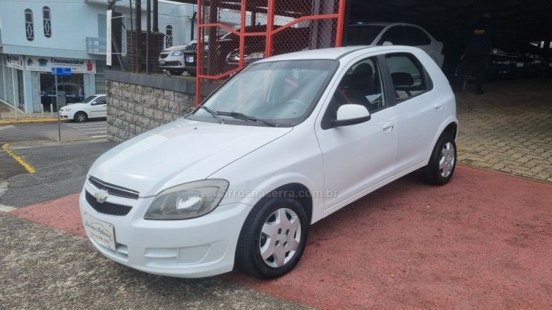 CHEVROLET CELTA 1.0 MPFI LT 8V 2013/2014 HUBNER MULTIMARCAS FARROUPILHA / Carros no Vale