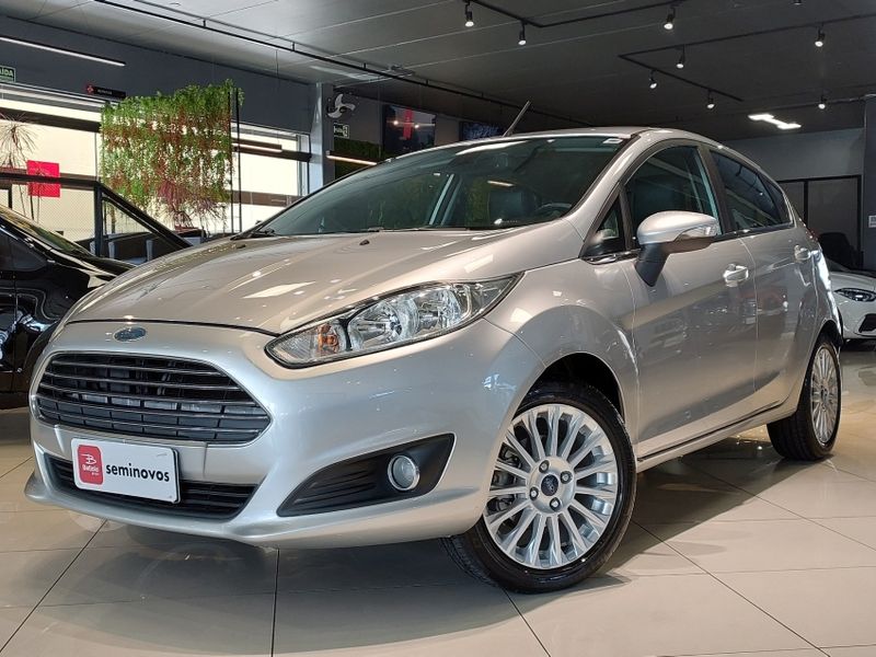 Ford FIESTA 1.6 TITANIUM HATCH 16V FLEX 4P MANUAL 2013/2014 BETIOLO NOVOS E SEMINOVOS LAJEADO / Carros no Vale Ford FIESTA 1.6 TITANIUM HATCH 16V FLEX 4P MANUAL 2013/2014 BETIOLO NOVOS E SEMINOVOS LAJEADO / Carros no Vale