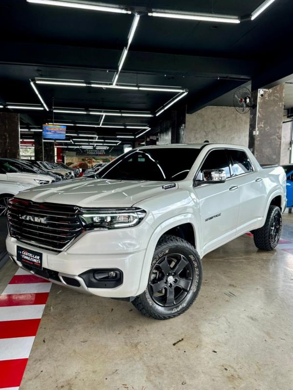 Ram RAMPAGE 2.0 HURRICANE 4 TURBO GASOLINA LARAMIE 4X4 AUTOMÁTICO 2023/2024 CASTELLAN E TOMAZONI MOTORS CAXIAS DO SUL / Carros no Vale Ram RAMPAGE 2.0 HURRICANE 4 TURBO GASOLINA LARAMIE 4X4 AUTOMÁTICO 2023/2024 CASTELLAN E TOMAZONI MOTORS CAXIAS DO SUL / Carros no Vale