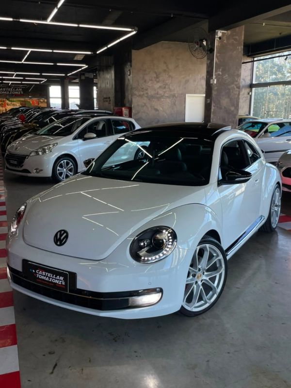 Volkswagen FUSCA 2.0 TSI 16V GASOLINA 2P AUTOMÁTICO 2014/2014 CASTELLAN E TOMAZONI MOTORS CAXIAS DO SUL / Carros no Vale Volkswagen FUSCA 2.0 TSI 16V GASOLINA 2P AUTOMÁTICO 2014/2014 CASTELLAN E TOMAZONI MOTORS CAXIAS DO SUL / Carros no Vale