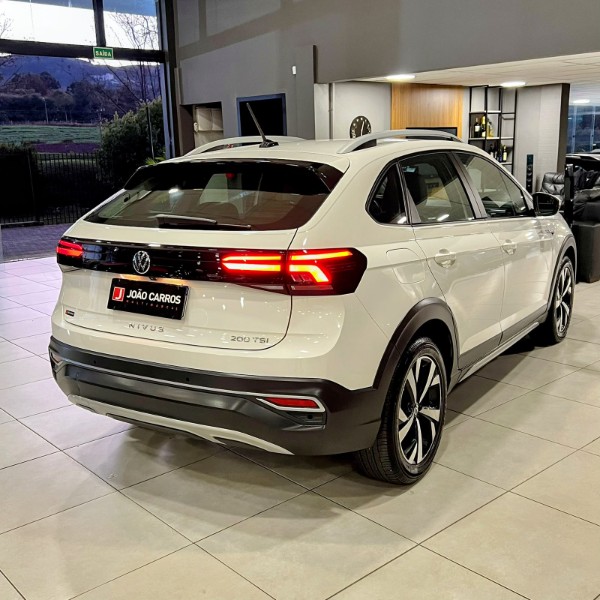 VOLKSWAGEN NIVUS 1.0 TSI HIGHLINE FLEX 4P AUTOMÁTICO 2022/2022 JOÃO CARROS MULTIMARCAS GUAPORÉ / Carros no Vale VOLKSWAGEN NIVUS 1.0 TSI HIGHLINE FLEX 4P AUTOMÁTICO 2022/2022 JOÃO CARROS MULTIMARCAS GUAPORÉ / Carros no Vale