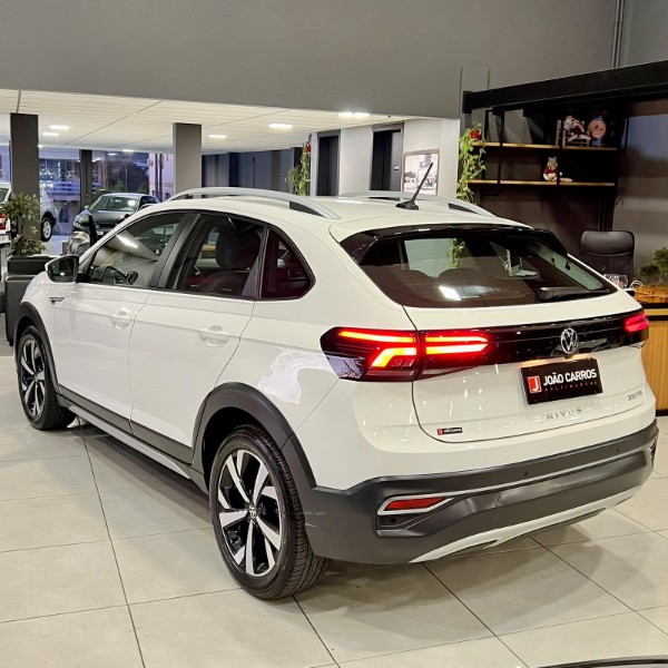 VOLKSWAGEN NIVUS 1.0 TSI HIGHLINE FLEX 4P AUTOMÁTICO 2022/2022 JOÃO CARROS MULTIMARCAS GUAPORÉ / Carros no Vale VOLKSWAGEN NIVUS 1.0 TSI HIGHLINE FLEX 4P AUTOMÁTICO 2022/2022 JOÃO CARROS MULTIMARCAS GUAPORÉ / Carros no Vale