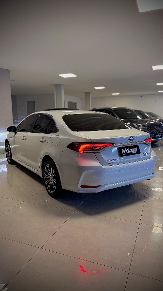 TOYOTA COROLLA 1.8 ALTIS PREMIUM 16V HÍBRIDO 2022/2023 MALAGGI VEÍCULOS ENCANTADO / Carros no Vale TOYOTA COROLLA 1.8 ALTIS PREMIUM 16V HÍBRIDO 2022/2023 MALAGGI VEÍCULOS ENCANTADO / Carros no Vale