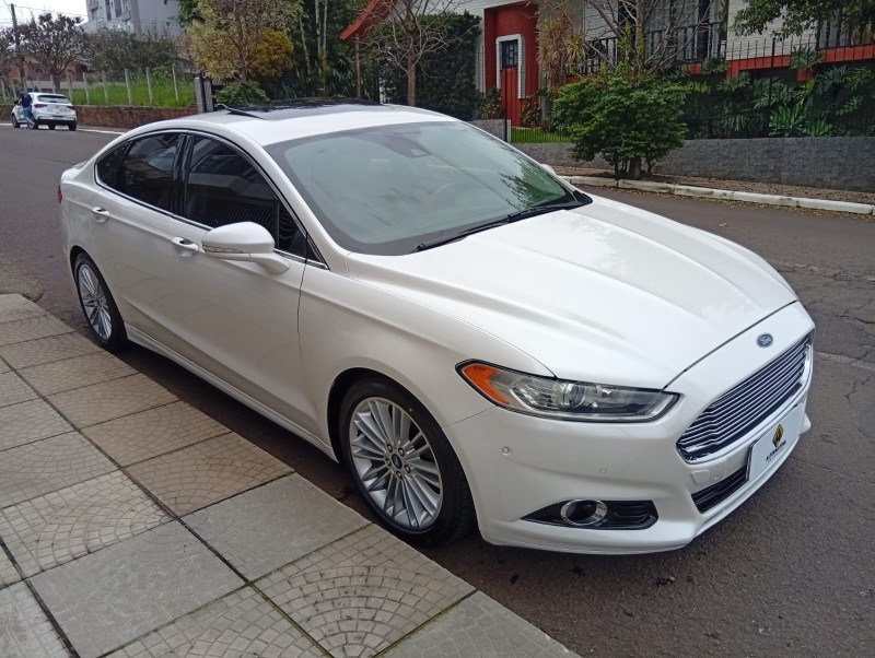 FORD FUSION 2.0 TITANIUM AWD 2013/2013 ALTERNATIVA VEÍCULOS LAJEADO / Carros no Vale FORD FUSION 2.0 TITANIUM AWD 2013/2013 ALTERNATIVA VEÍCULOS LAJEADO / Carros no Vale