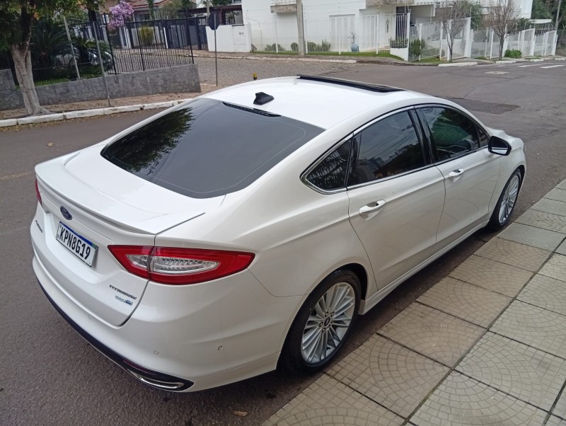FORD FUSION 2.0 TITANIUM AWD 2013/2013 ALTERNATIVA VEÍCULOS LAJEADO / Carros no Vale FORD FUSION 2.0 TITANIUM AWD 2013/2013 ALTERNATIVA VEÍCULOS LAJEADO / Carros no Vale