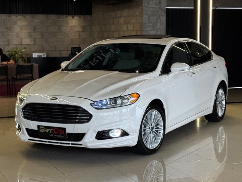 FORD FUSION 2.0 TITANIUM GTDI ECOBOOST AWD 2014/2015 GRIFFCAR MULTIMARCAS DOIS IRMÃOS / Carros no Vale FORD FUSION 2.0 TITANIUM GTDI ECOBOOST AWD 2014/2015 GRIFFCAR MULTIMARCAS DOIS IRMÃOS / Carros no Vale