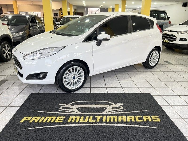 FORD FIESTA 1.6 TITANIUM HATCH 16V 2015/2015 PRIME MULTIMARCAS CAXIAS DO SUL / Carros no Vale FORD FIESTA 1.6 TITANIUM HATCH 16V 2015/2015 PRIME MULTIMARCAS CAXIAS DO SUL / Carros no Vale