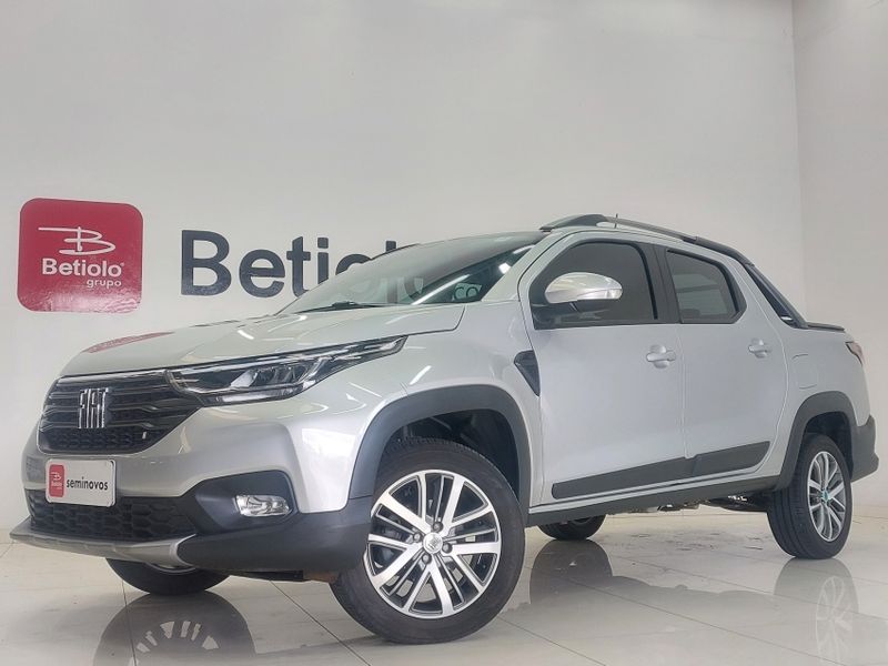 Fiat STRADA 1.3 FIREFLY FLEX VOLCANO CD CVT 2023/2023 BETIOLO NOVOS E SEMINOVOS LAJEADO / Carros no Vale Fiat STRADA 1.3 FIREFLY FLEX VOLCANO CD CVT 2023/2023 BETIOLO NOVOS E SEMINOVOS LAJEADO / Carros no Vale