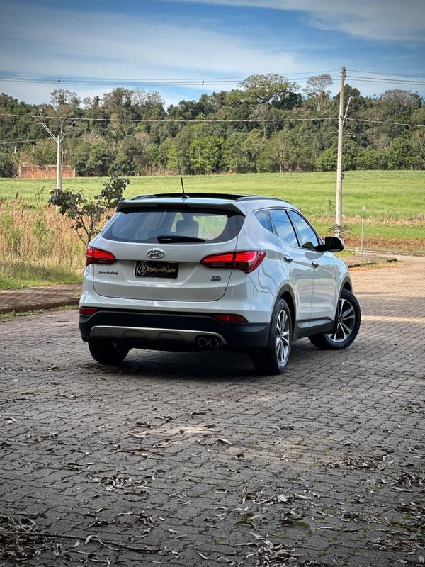 Hyundai SANTA FÉ 3.3 V6 2015 NEUMANN VEÍCULOS ARROIO DO MEIO / Carros no Vale Hyundai SANTA FÉ 3.3 V6 2015 NEUMANN VEÍCULOS ARROIO DO MEIO / Carros no Vale