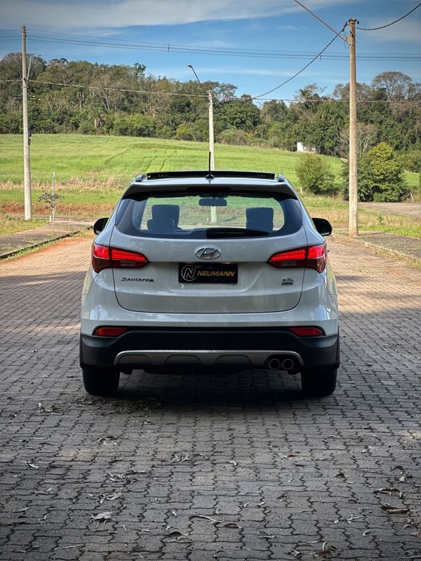 Hyundai SANTA FÉ 3.3 V6 2015 NEUMANN VEÍCULOS ARROIO DO MEIO / Carros no Vale Hyundai SANTA FÉ 3.3 V6 2015 NEUMANN VEÍCULOS ARROIO DO MEIO / Carros no Vale