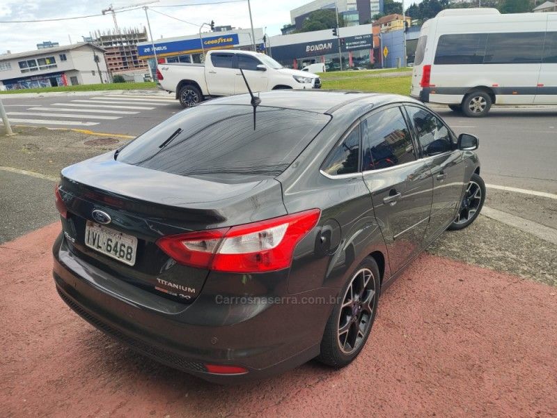 FORD FOCUS 2.0 TITANIUM FASTBACK 16V 2014/2014 HUBNER MULTIMARCAS FARROUPILHA / Carros no Vale FORD FOCUS 2.0 TITANIUM FASTBACK 16V 2014/2014 HUBNER MULTIMARCAS FARROUPILHA / Carros no Vale