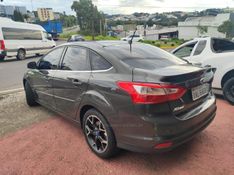 FORD FOCUS 2.0 TITANIUM FASTBACK 16V 2014/2014 HUBNER MULTIMARCAS FARROUPILHA / Carros no Vale