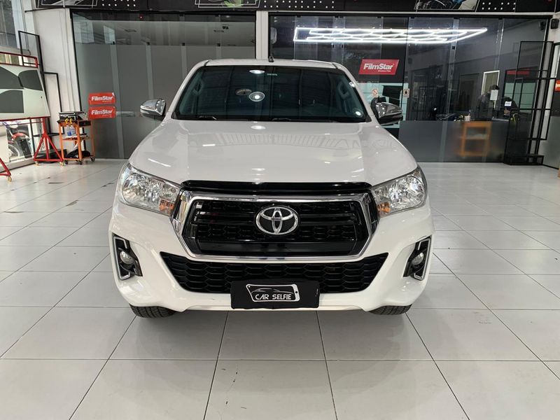 TOYOTA HILUX 2.7 SRV 4X4 CD 16V FLEX 4P AUTOMÁTICO 2019/2020 FÁBIO BERNARDES PORTO ALEGRE / Carros no Vale TOYOTA HILUX 2.7 SRV 4X4 CD 16V FLEX 4P AUTOMÁTICO 2019/2020 FÁBIO BERNARDES PORTO ALEGRE / Carros no Vale
