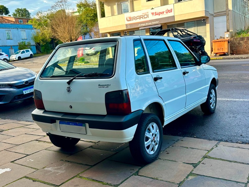 FIAT UNO MILLE ECONOMY 1.0 2011/2012 SÉTIMA VEÍCULOS GUAPORÉ / Carros no Vale
