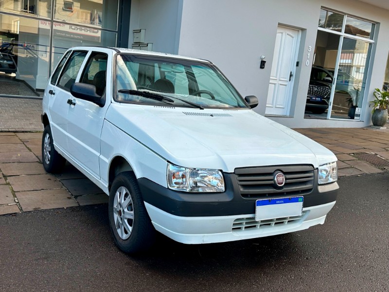 FIAT UNO MILLE ECONOMY 1.0 2011/2012 SÉTIMA VEÍCULOS GUAPORÉ / Carros no Vale