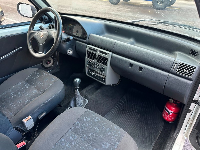 FIAT UNO MILLE ECONOMY 1.0 2011/2012 SÉTIMA VEÍCULOS GUAPORÉ / Carros no Vale