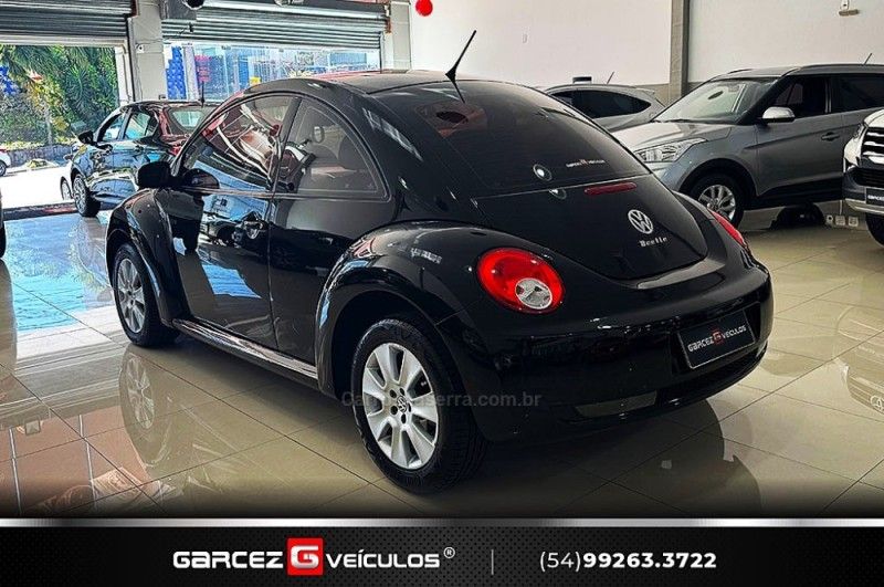 VOLKSWAGEN NEW BEETLE 2.0 MI 8V TIPTRONIC 2008/2008 GARCEZ VEÍCULOS BENTO GONÇALVES / Carros no Vale VOLKSWAGEN NEW BEETLE 2.0 MI 8V TIPTRONIC 2008/2008 GARCEZ VEÍCULOS BENTO GONÇALVES / Carros no Vale