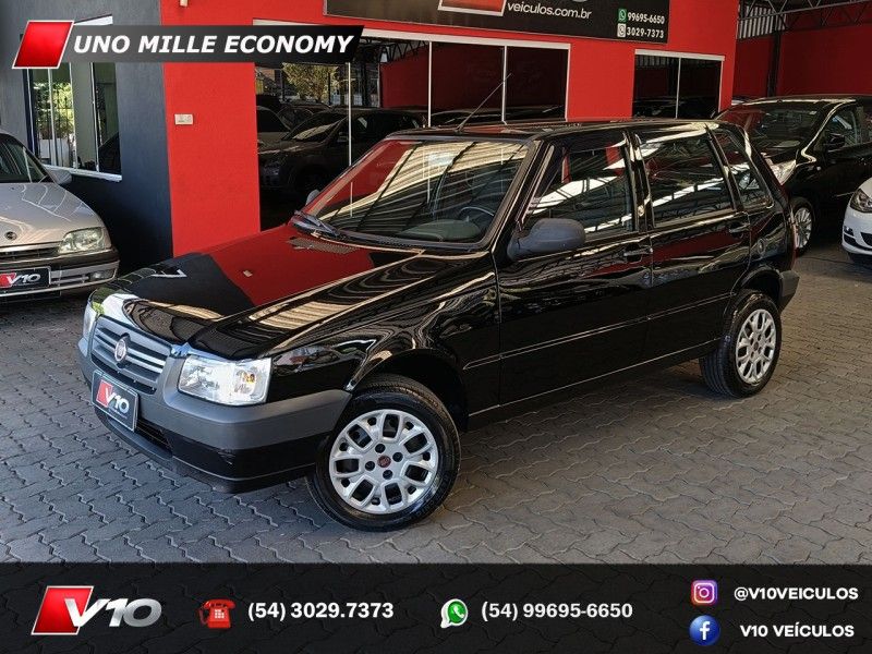 FIAT UNO 1.0 MPI MILLE FIRE ECONOMY 8V 2012/2012 V10 VEÍCULOS CAXIAS DO SUL / Carros no Vale