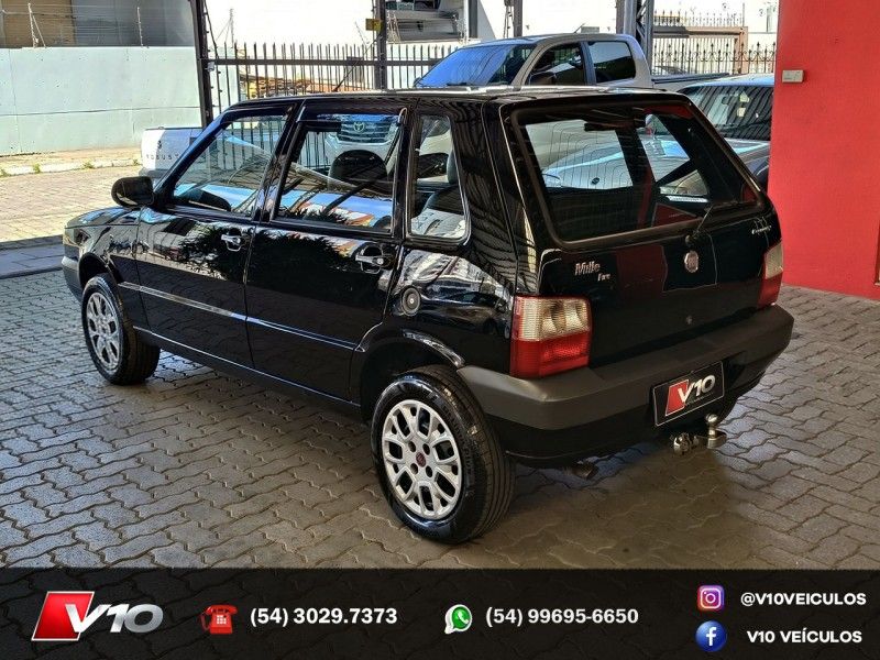 FIAT UNO 1.0 MPI MILLE FIRE ECONOMY 8V 2012/2012 V10 VEÍCULOS CAXIAS DO SUL / Carros no Vale