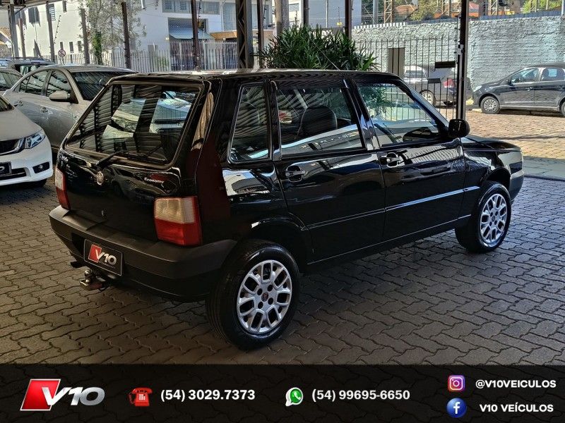FIAT UNO 1.0 MPI MILLE FIRE ECONOMY 8V 2012/2012 V10 VEÍCULOS CAXIAS DO SUL / Carros no Vale