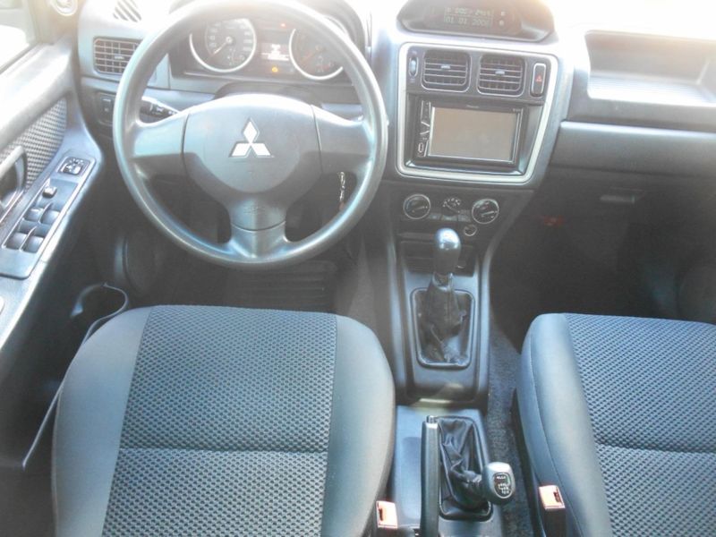 Mitsubishi PAJERO TR4 2.0 GLS 4X4 16V FLEX 4P MANUAL 2011/2012 CAMINHÕES & CAMIONETAS PASSO FUNDO / Carros no Vale Mitsubishi PAJERO TR4 2.0 GLS 4X4 16V FLEX 4P MANUAL 2011/2012 CAMINHÕES & CAMIONETAS PASSO FUNDO / Carros no Vale