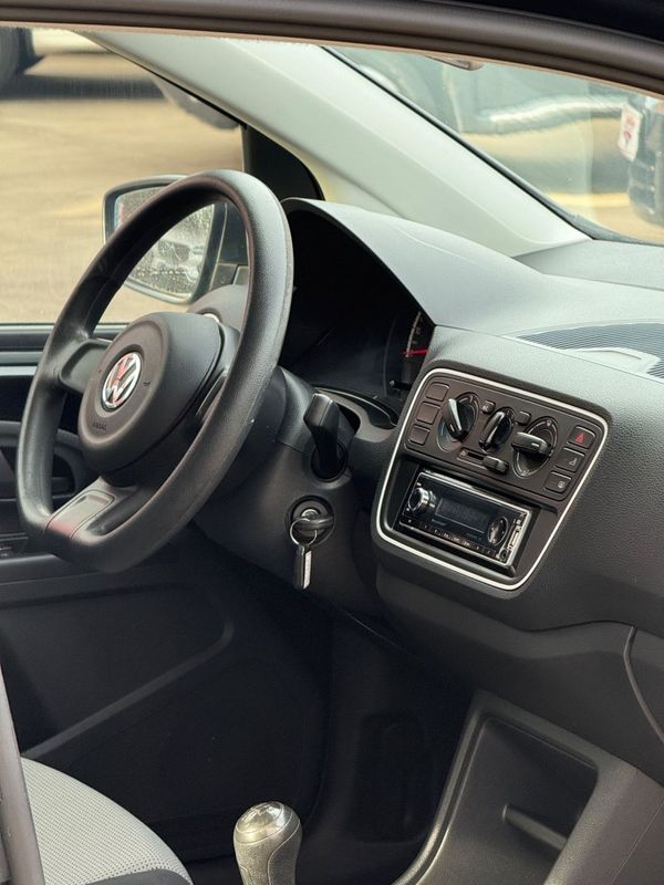 Volkswagen UP TAKE 1.0 2015 FERREIRA VEÍCULOS VENÂNCIO AIRES / Carros no Vale
