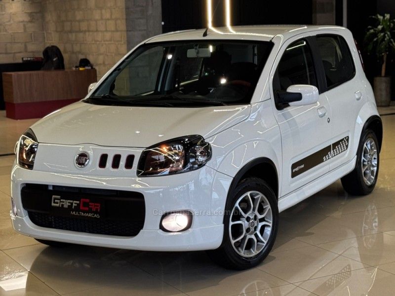 FIAT UNO 1.4 SPORTING 8V 2012/2013 GRIFFCAR MULTIMARCAS DOIS IRMÃOS / Carros no Vale