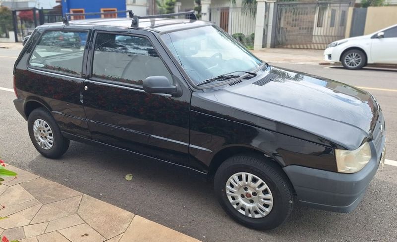 Fiat UNO 1.0 MPI MILLE FIRE ECONOMY 8V FLEX 2P MANUAL 2013/2013 CAMINHÕES & CAMIONETAS PASSO FUNDO / Carros no Vale