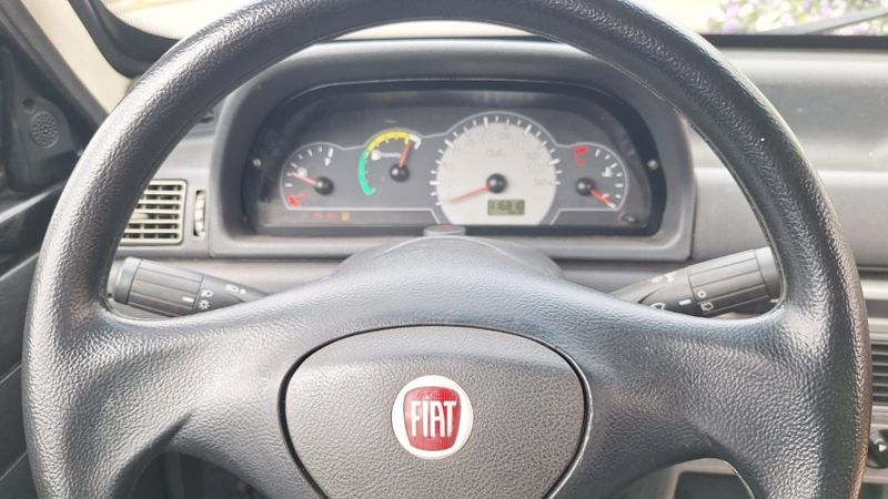 Fiat UNO 1.0 MPI MILLE FIRE ECONOMY 8V FLEX 2P MANUAL 2013/2013 CAMINHÕES & CAMIONETAS PASSO FUNDO / Carros no Vale
