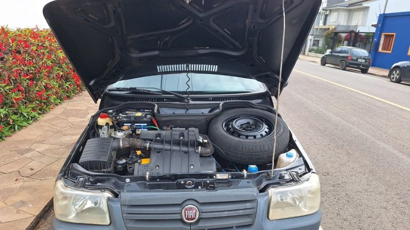 Fiat UNO 1.0 MPI MILLE FIRE ECONOMY 8V FLEX 2P MANUAL 2013/2013 CAMINHÕES & CAMIONETAS PASSO FUNDO / Carros no Vale