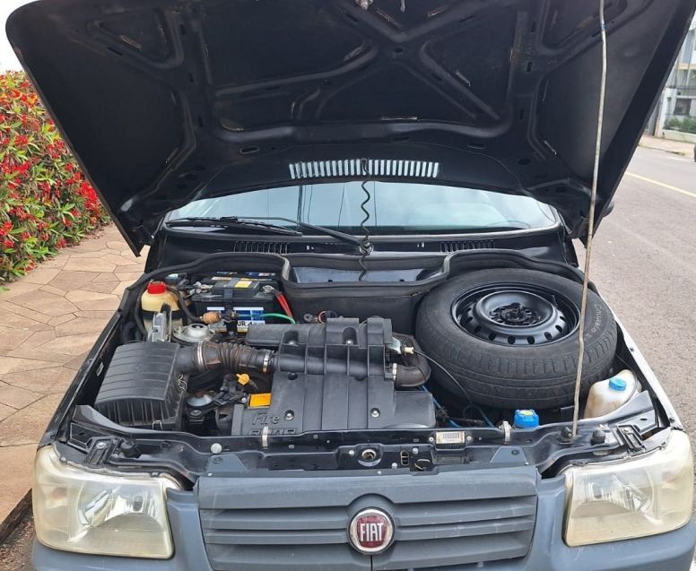 Fiat UNO 1.0 MPI MILLE FIRE ECONOMY 8V FLEX 2P MANUAL 2013/2013 CAMINHÕES & CAMIONETAS PASSO FUNDO / Carros no Vale