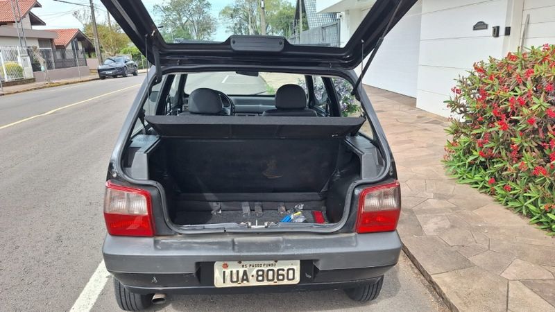 Fiat UNO 1.0 MPI MILLE FIRE ECONOMY 8V FLEX 2P MANUAL 2013/2013 CAMINHÕES & CAMIONETAS PASSO FUNDO / Carros no Vale